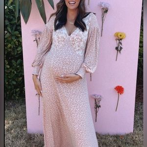 Free people dress! Fits pregnant or not! Very stretchy and comfortable.